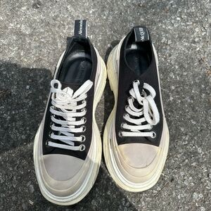 Authentic Alexander Mcqueen black and white slick sneakers